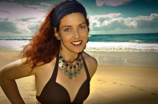 Glamorous preset and hair smoothers used form portrait pro. I think it is over done for a beach scene but I did it so you could see the differences.
